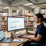 Warehouse manager using an inventory management system to determine the right inventory reorder point and prevent stock shortages