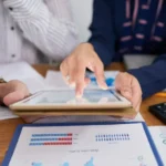 Inventory manager analyzing sales and purchase data to improve stock planning and inventory decisions