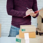 Procurement manager reviewing inventory and purchase data before placing a large purchase order