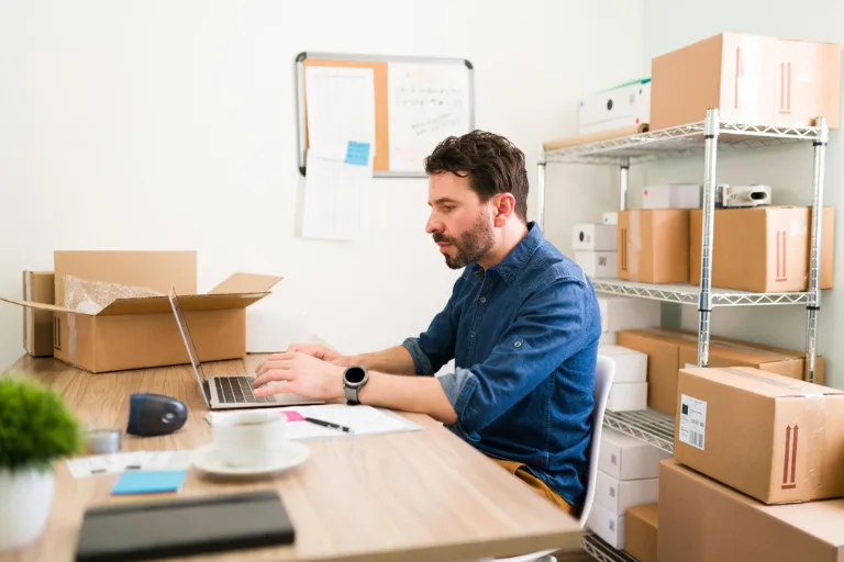 Inventory manager reviewing demand, lead time, and safety stock data to determine the right inventory reorder point
