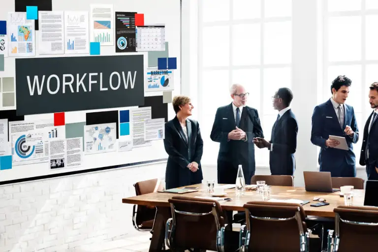 Operations manager using workforce utilization software to optimize manpower planning and employee productivity