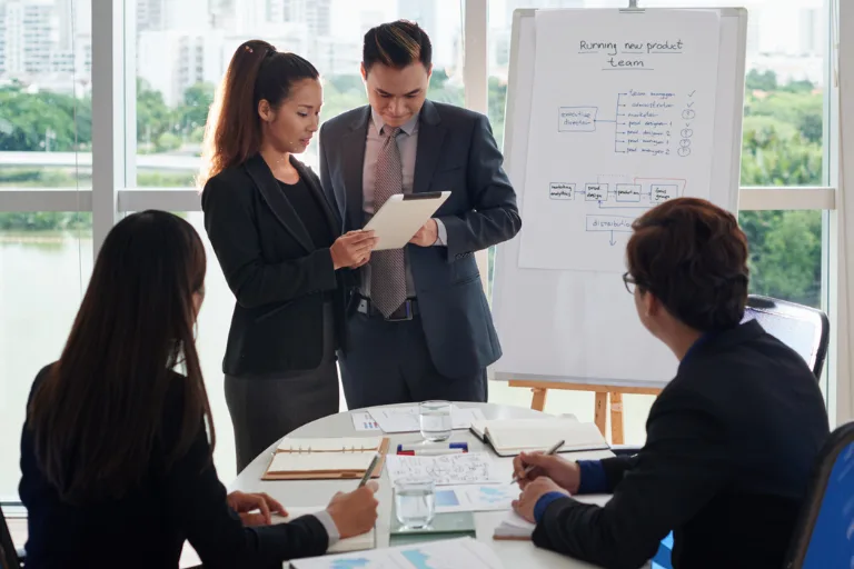 Operations manager analysing workforce utilisation and manpower planning data for improved operational efficiency